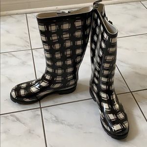 Black and white rain boots